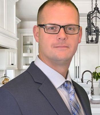 Portrait of Adam Harding, Realtor.
